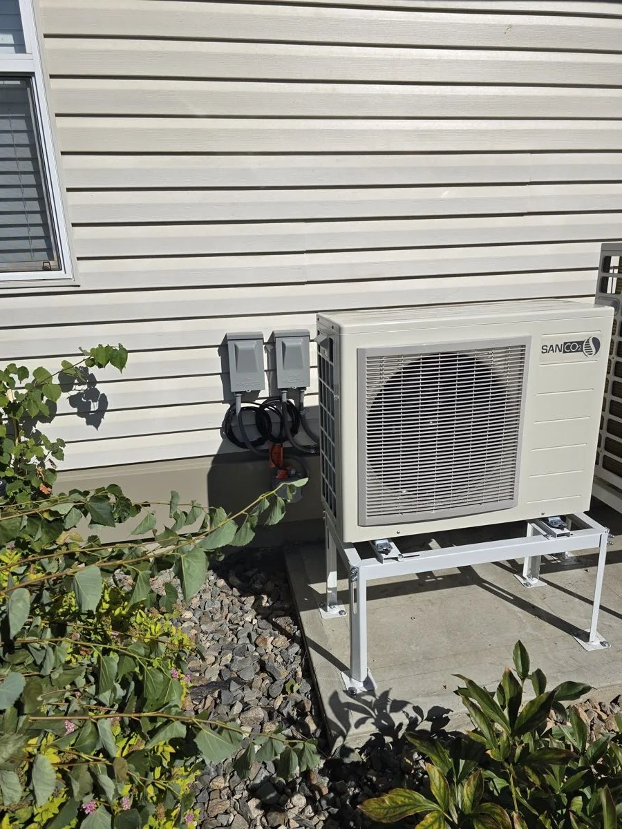 Outdoor heat pump and air conditioning unit installed by Big Boy Enterprises
