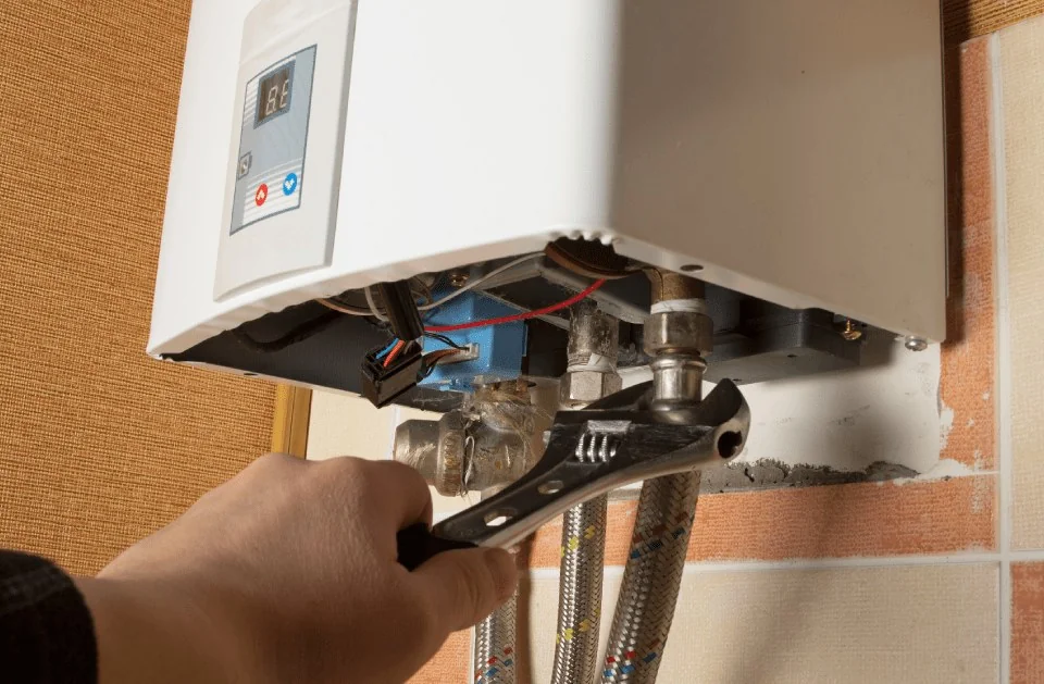 Servicing a wall-mounted gas boiler unit