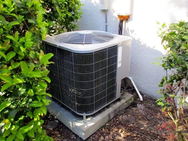 Air conditioning condenser unit installed by Big Boy Enterprises